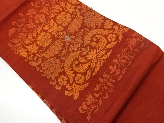 手織り紬ふくれ織花唐草模様織出し名古屋帯